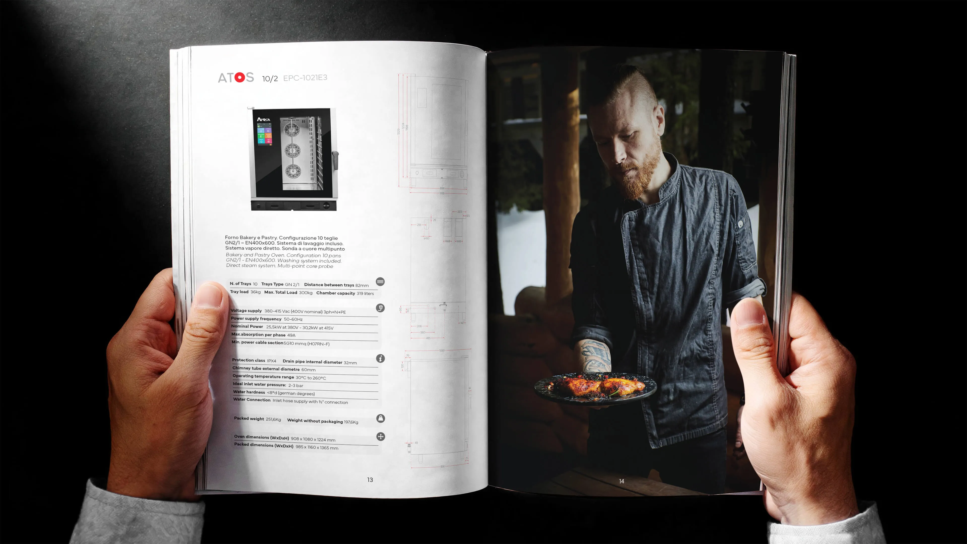 Hands holding open a catalogue showing on the left a technical page with an image and specifications of a bakery and pastry oven, and on the right a photo of a chef with a beard and tattoos wearing a dark chef's jacket holding a plate with roasted chicken.