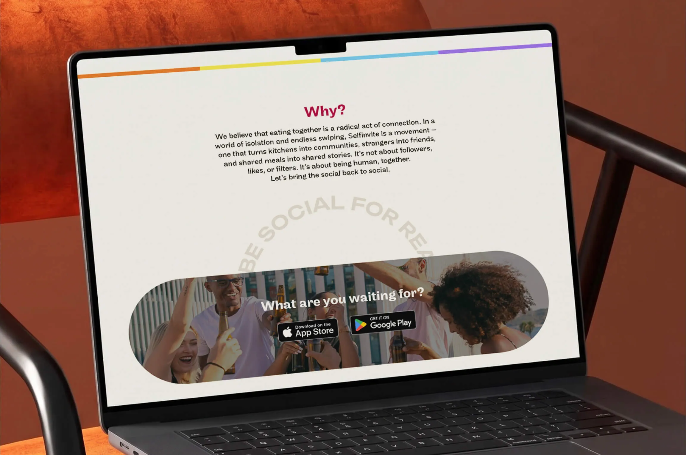 Laptop screen showing a webpage with text explaining the importance of eating together for connection and community, promoting the Selfinvite movement. Below the text, an image of a diverse group of friends enjoying drinks together is visible, with the question 'What are you waiting for?' followed by download buttons for the App Store and Google Play.