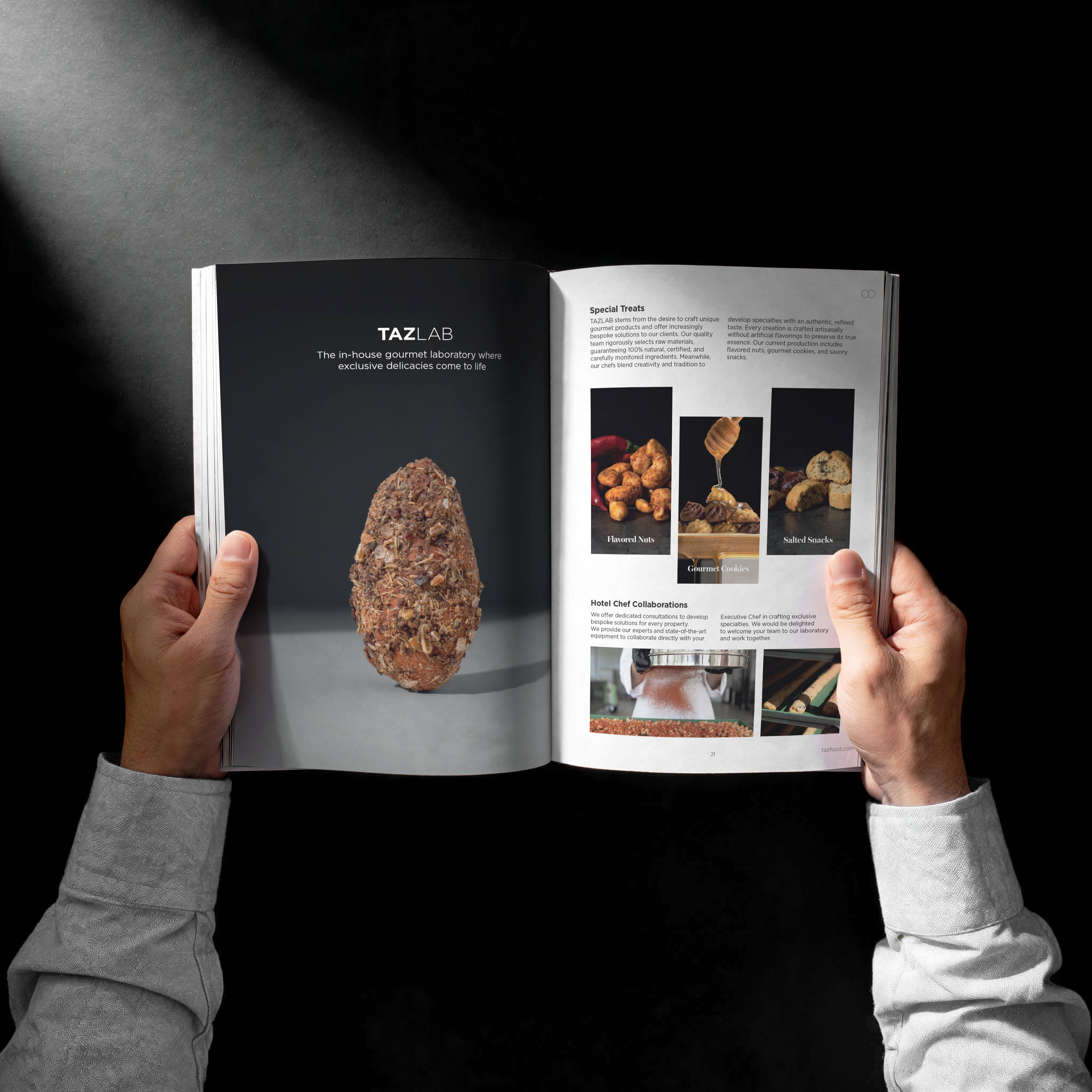 Two hands holding open a gourmet food catalog against a dark background; left page shows a close-up of a spiced nut cluster with the text 'TAZLAB The in-house gourmet laboratory where exclusive delicacies come to life'; right page features sections titled 'Special Treats' and 'Hotel Chef Collaborations' with photos of flavored nuts, gourmet cookies, salted snacks, and chefs working.